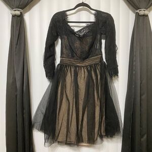 JJ’s House black Lacey knee length dress, lightly padded, nude undertone